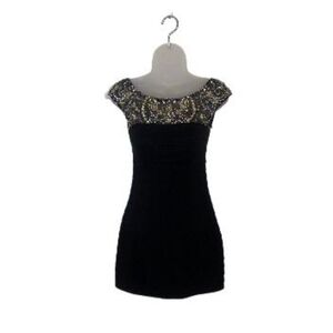 Elegant Black Dress with Gold Embellishments